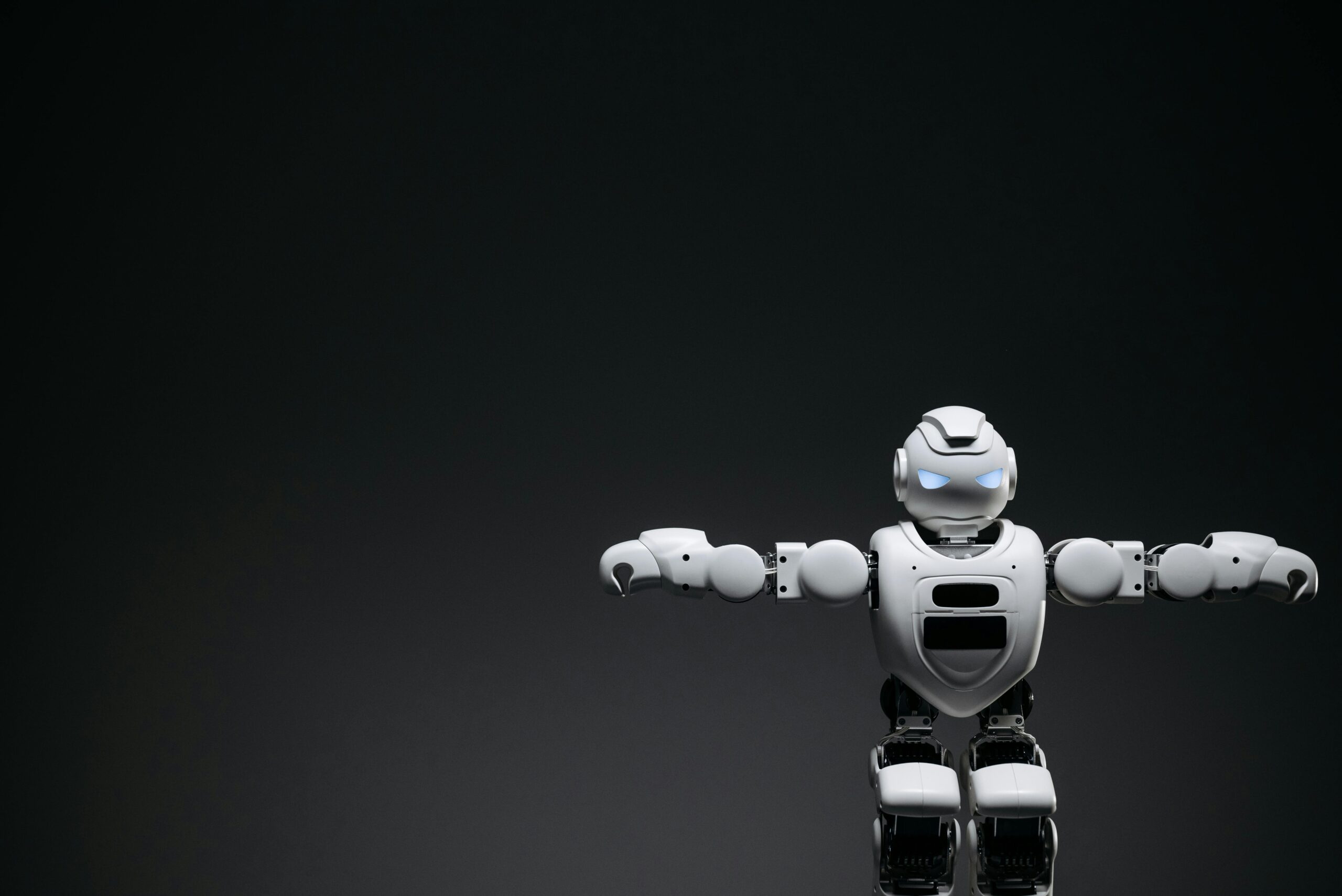 white robot toy representing AI agents vs automation decision for solo founders