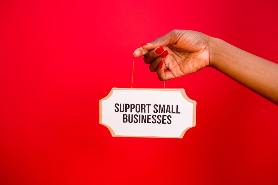 support small businesses sign representing solo business resilience