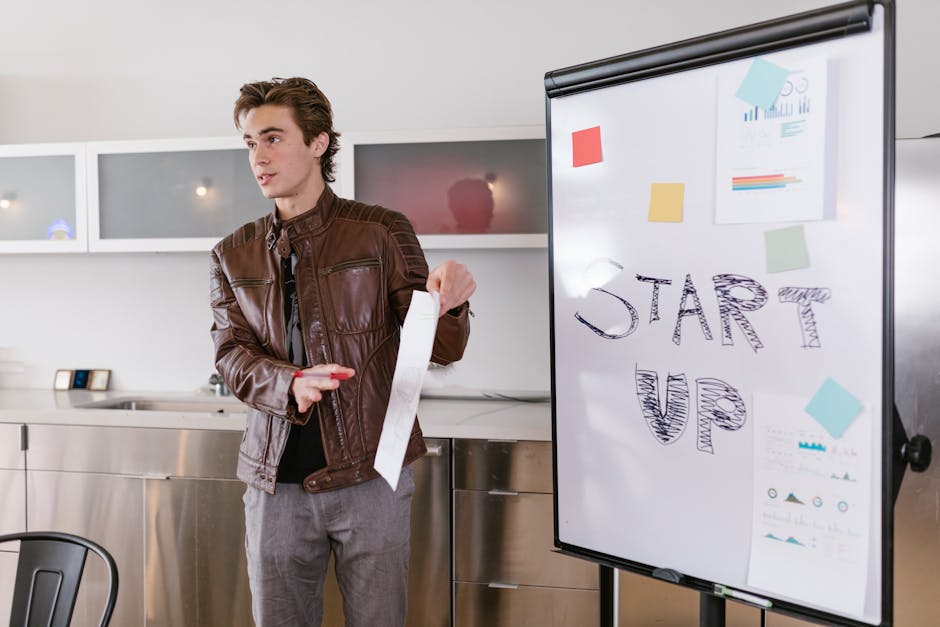 Entrepreneur presenting startup strategy on flip chart