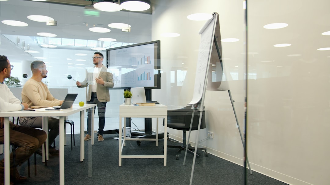 Investor pitch presentation in boardroom for AI startup funding