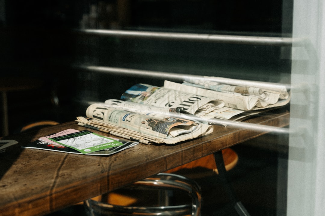 Stack of newsletters showing reading habit growth in 2026