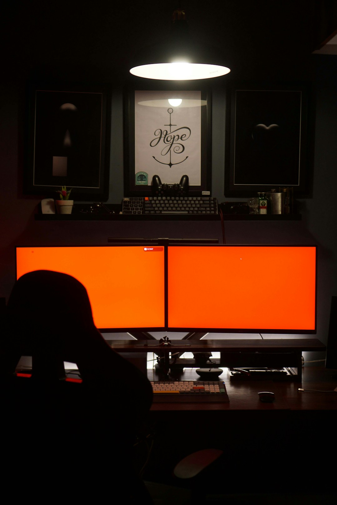 Solopreneur productivity workspace with multiple monitors