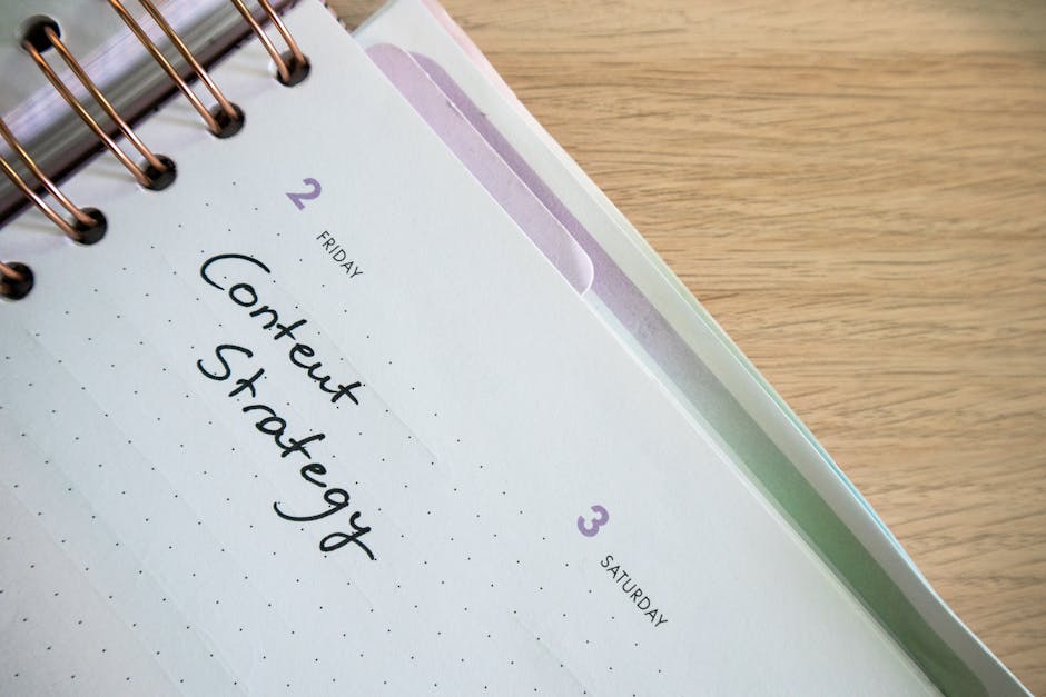 Solopreneur planning a content calendar in a notebook