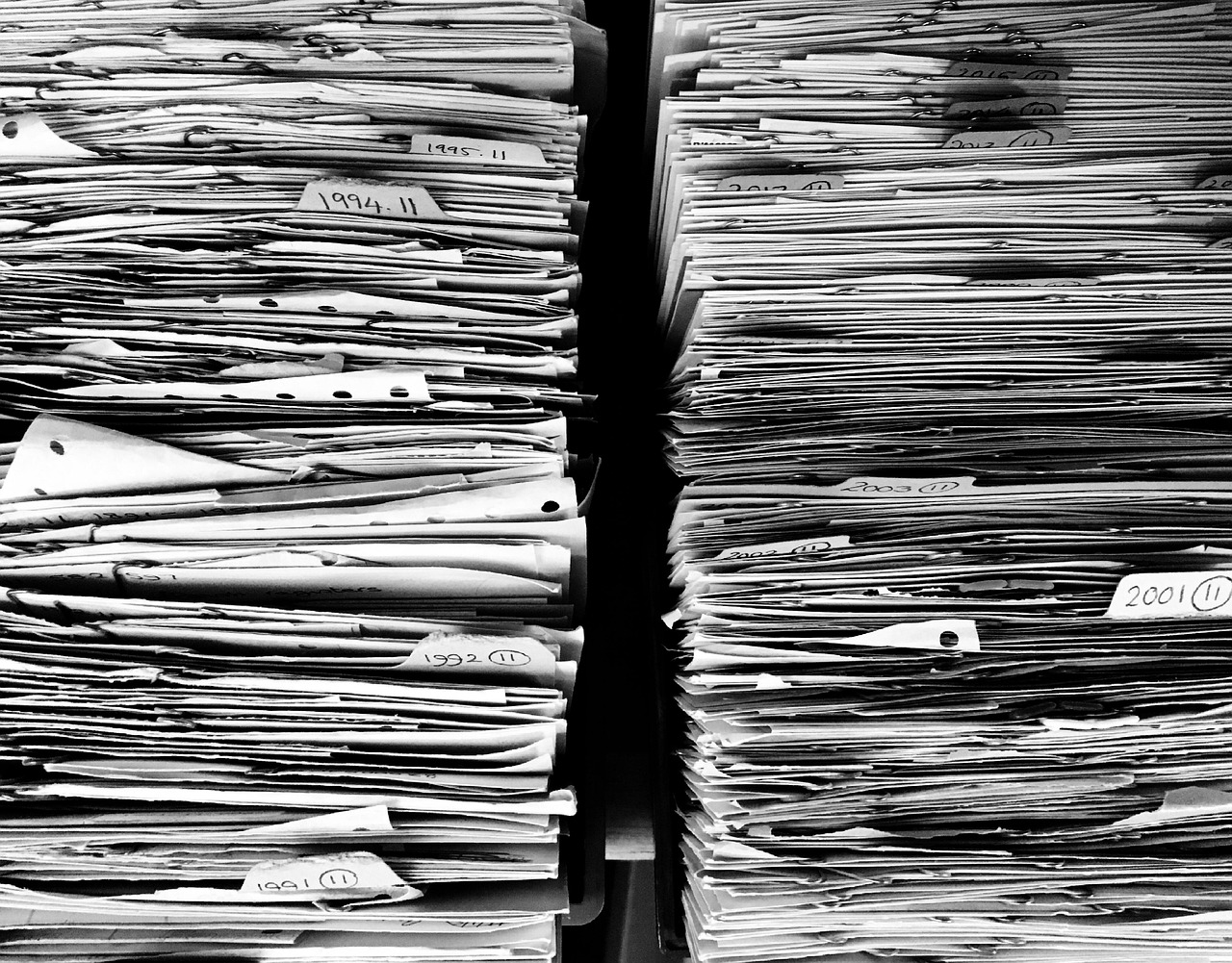 Stack of printed documents used as a source for repurposed content