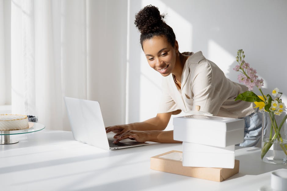 Solo founder handling back office tasks with AI tools on a laptop