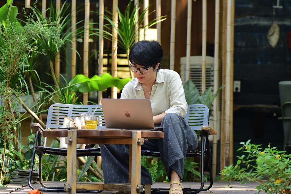 Solo founder working at cafe while Spark runs tasks in cloud