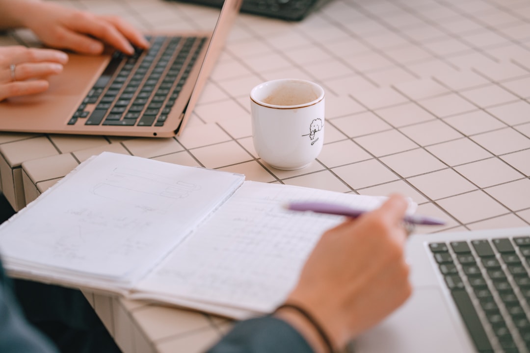 Solopreneur planning weekly tasks with Notion AI Agents on a laptop