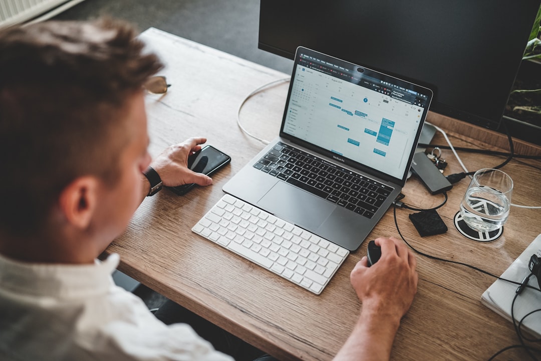 solopreneur working on a laptop in a home office