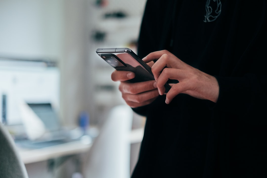 Solopreneur receiving Gemini Spark notifications on phone