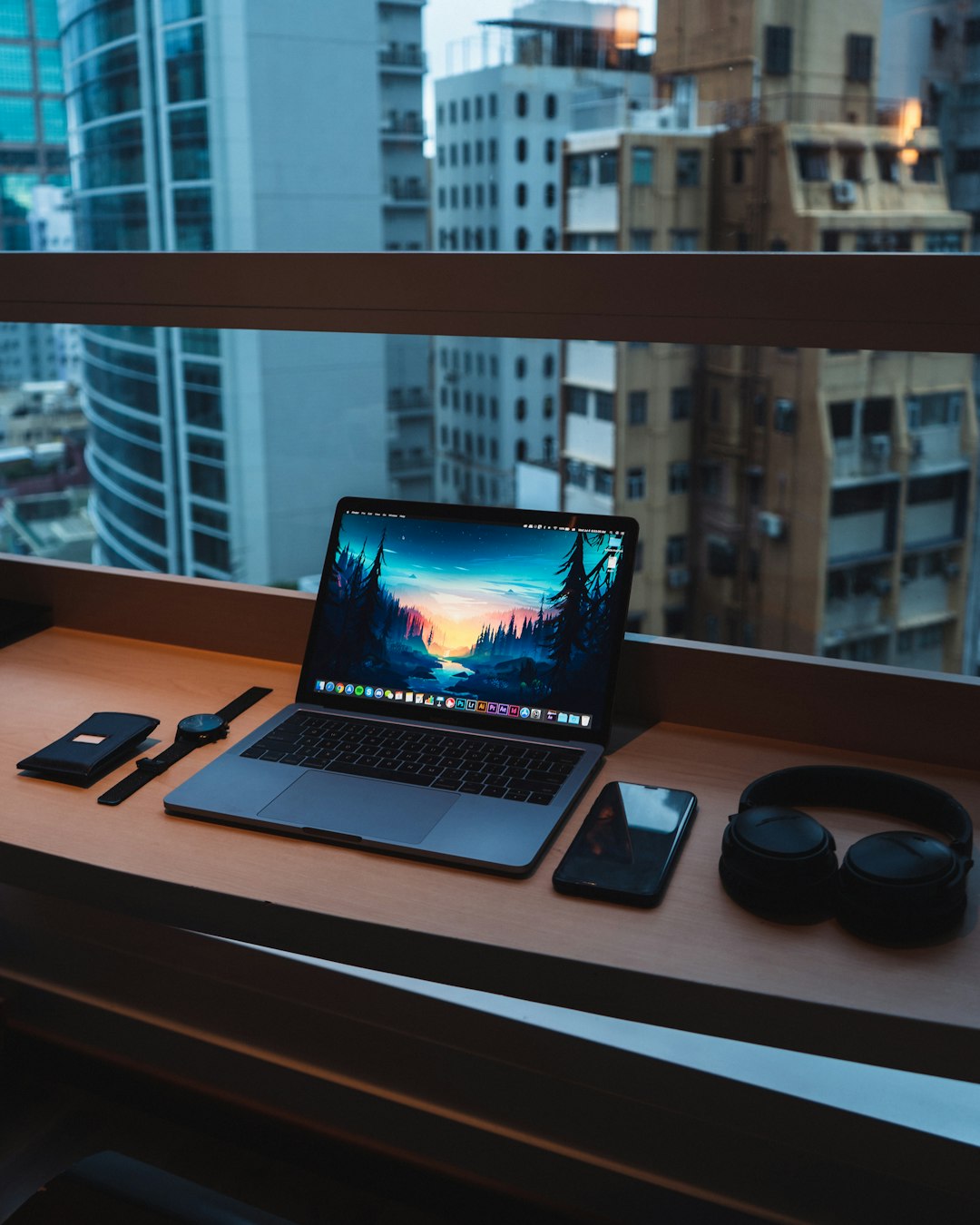 Solopreneur productivity workspace with laptop and ZoomMate dashboard